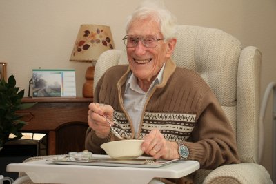 A man eats meals on wheels. Credit: Hertfordshire Independent Living Service