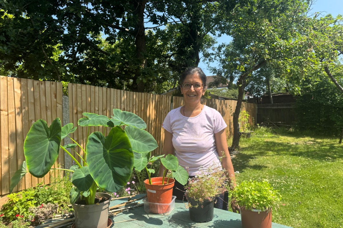 Niru planting eddoes and coriander- South Asian Veg Workshop Asset. Credit: Niru Patel