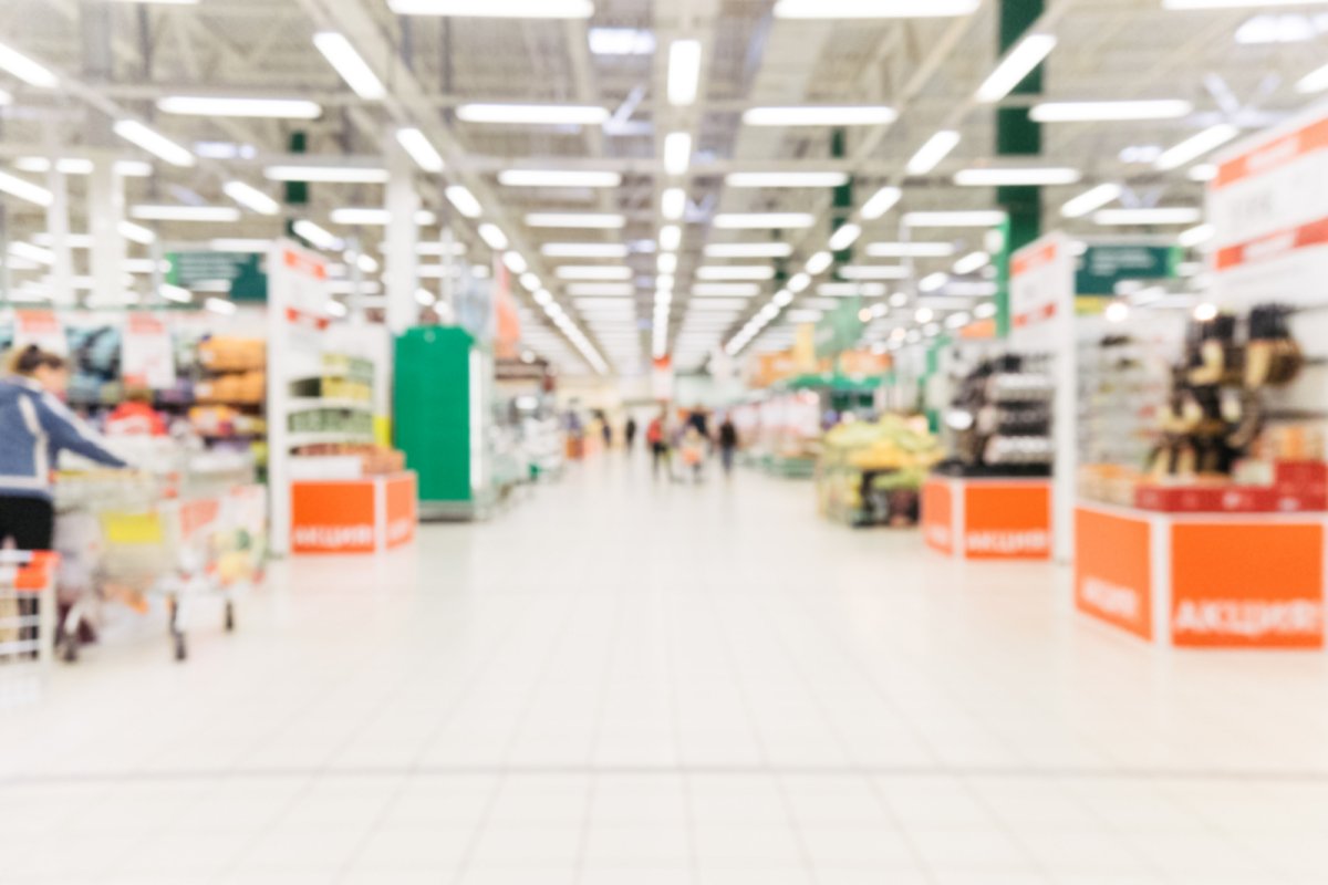Blurred supermarket aisle . Copyright: Fascinadora | shutterstock