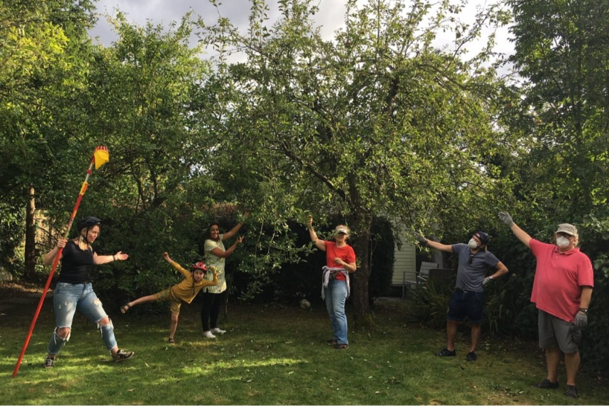 Kensal to Kilburn pickers under a tree happy with poles. Credit: Michael Stuart
