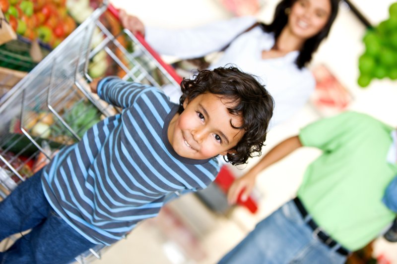 Young boy in supermarket. Copyright: ESB Professional | shutterstock