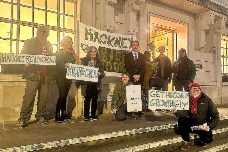 Right to Grow campaigners displaying banners outside Hackney town hall . Credit: Glyn Harries