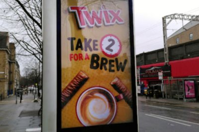 An advert for confectionery on a street in Tower Hamlets. Credit: Fran Bernhardt, Sustain