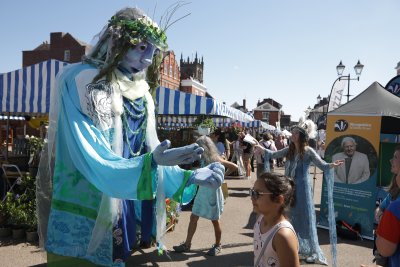 Goddess of the Wye and Lady of the Wye in Ludlow Square for Ludlow Green Festival. Credit: Eamon Bourke