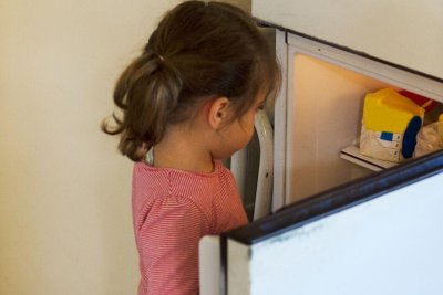 Child looking for food in the fridge. Credit: The Food Foundation