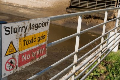 Slurry Lagoon sign at a dairy farm. Copyright: chrisbrignell | shutterstock