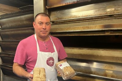 Iulian Varodin with The People's Loaf. Copyright: Aston's Bakehouse