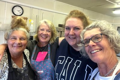 Caroline Marazzi (left) with baking students . Copyright: Sally Irving