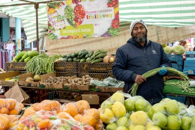 Market Trader at Chrisp St Market. Copyright: Alexandra Rose Charity