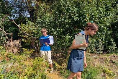 Bug hunters Sara and Melina at Christchurch Community Garden. Credit: Lula Wattam