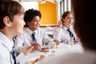  High School Students Eating Lunch . Copyright: Monkey Business Images |Shutterstock