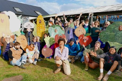 Sutton Community Farm fundraiser- image of people dressed up like vegetables all gathered for a photo. Credit: Sutton Community Farm