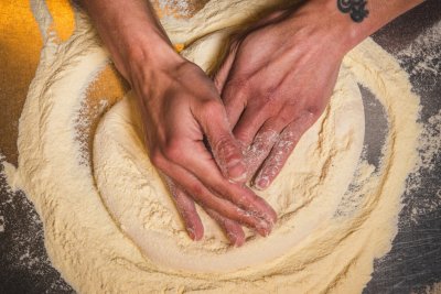 Four Hundred Rabbits sourdough pizza base shaping. Copyright: Nic Crilly-Hargrave