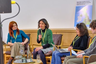 Ruth Westcott, Sustain (left), chairs a panel on a just transition from intensive livestock. Copyright: Hugh Warwick