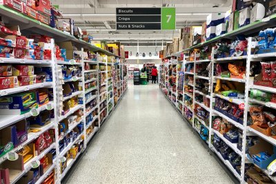 Products in the aisles of a supermarket.. Copyright: photocritical | shutterstock