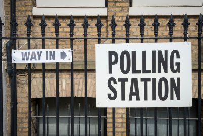 A polling station sign. Credit: Lazyllama: Shutterstock