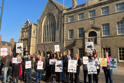 Campaigners outside Kings Lynn Council building before the Methwold megafarm decision. Credit: Lily O'Mara