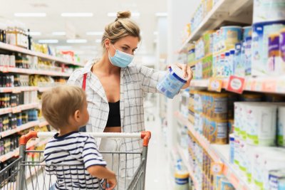 A mother shopping for baby formula . Copyright: BLACKDAY | shutterstock