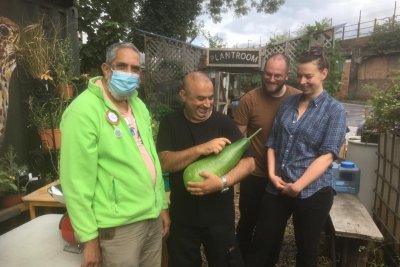 Loughborough Farm team members proud of their gourd-geous harvest winner. Copyright: Loughborough Farm