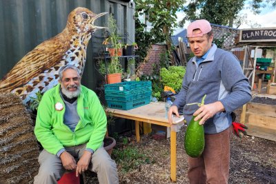 Guessing the weight of the gourd and the winner takes home!. Credit: Loughborough Farm