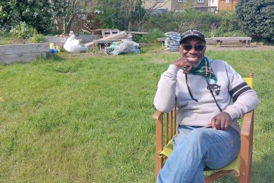 Duke Baysee, master of music-making and gardening, at Ital Community Garden. Copyright: Mayya Husseini