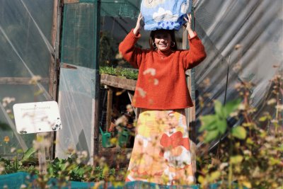 Grower Millie Sandy standing in a growing space. Credit: Mille Sandy