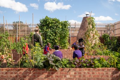 Raised planting bed and the wood fire open in Hackney School of Food's kitchen garden. Credit: Jim Stephenson