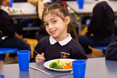 Enjoying a healthy lunch at Sacred Heart School, Battersea. Credit: Jon Goldberg / Children's Food Campaign