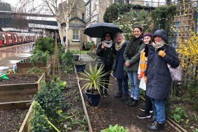 Finchley Central Energy Garden volunteers unphased by the elements. Copyright: Fi McAllister