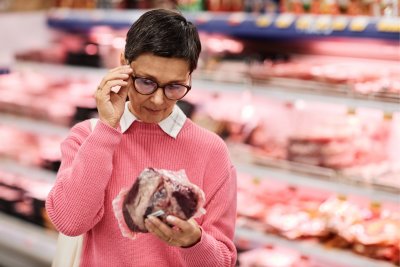 Woman shopping for groceries at the supermarket. Copyright: SeventyFour I istock