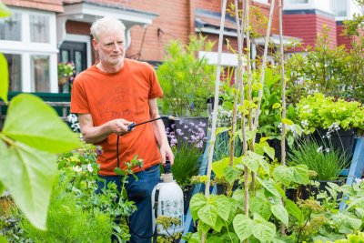 Mark tending to his container garden. Copyright: Mark Ridsdill Smith