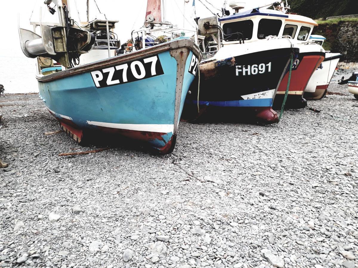 Cadgwith boats by Ben Renoylds
