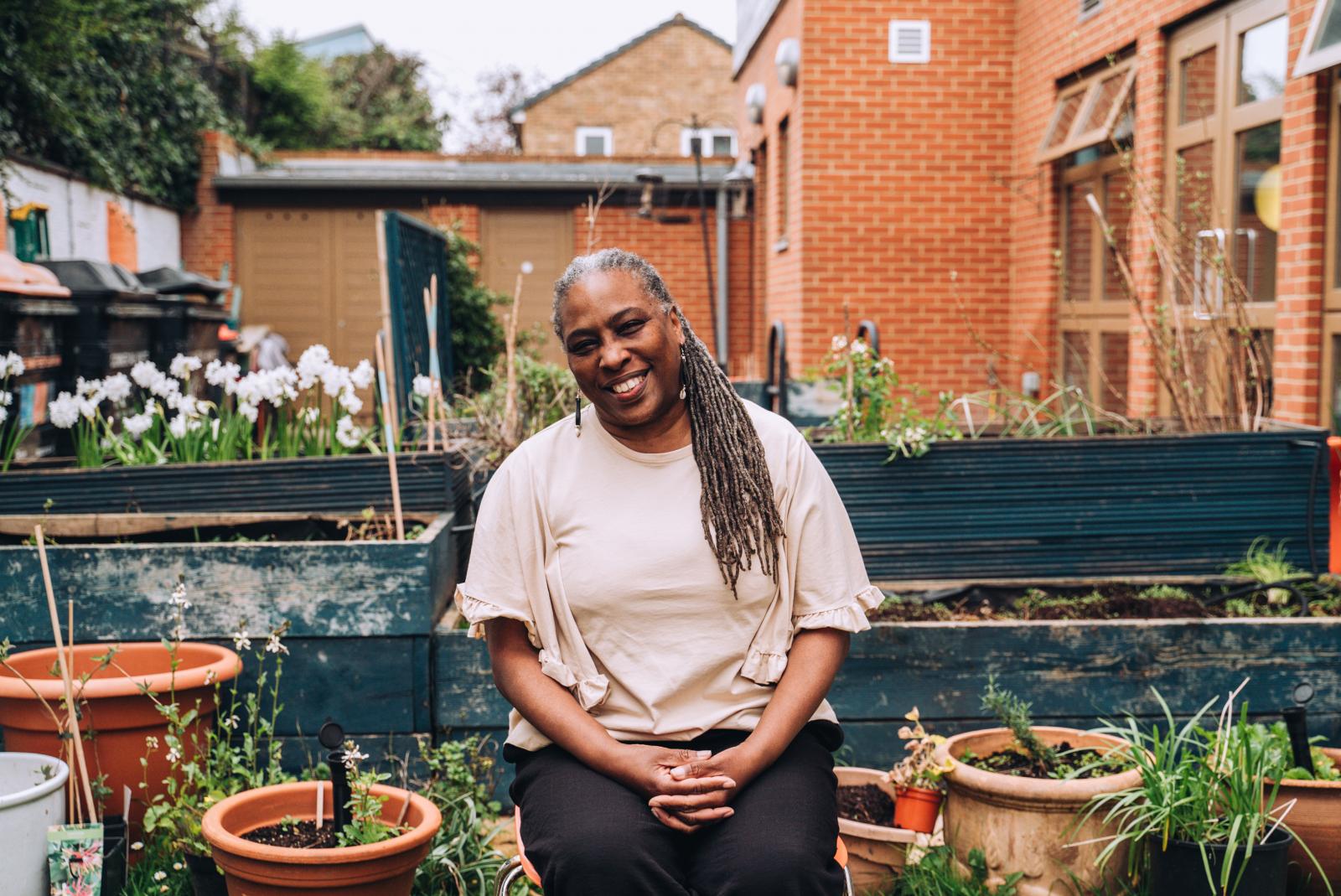 Jazz Browne, CEO of Nubian Life, at Josiah Braithwaite community garden. Photo credit: Emily Munster