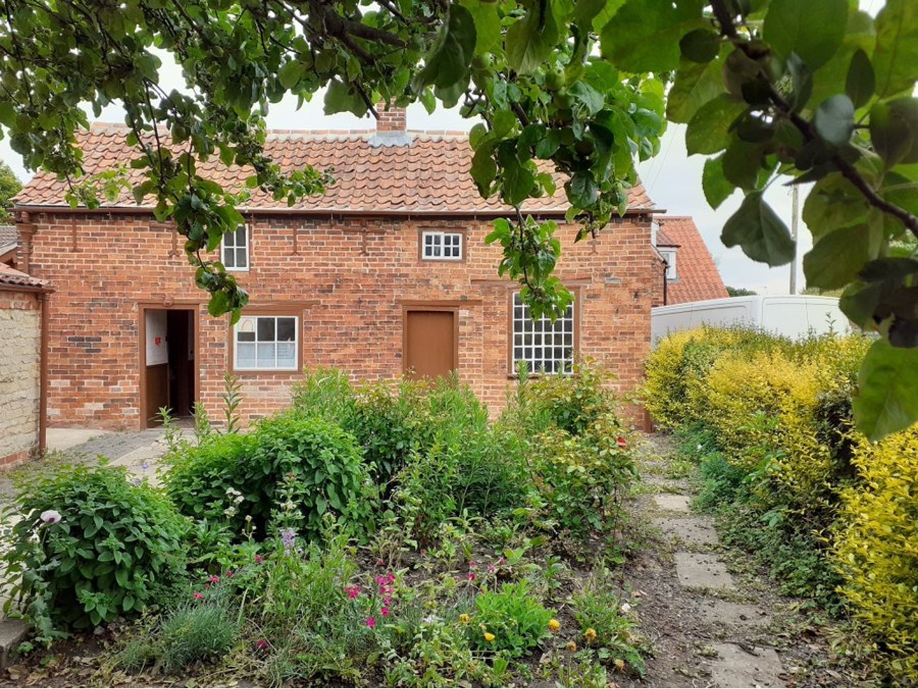 Mrs Smith in her garden. Credit: Mrs Smith's Museum