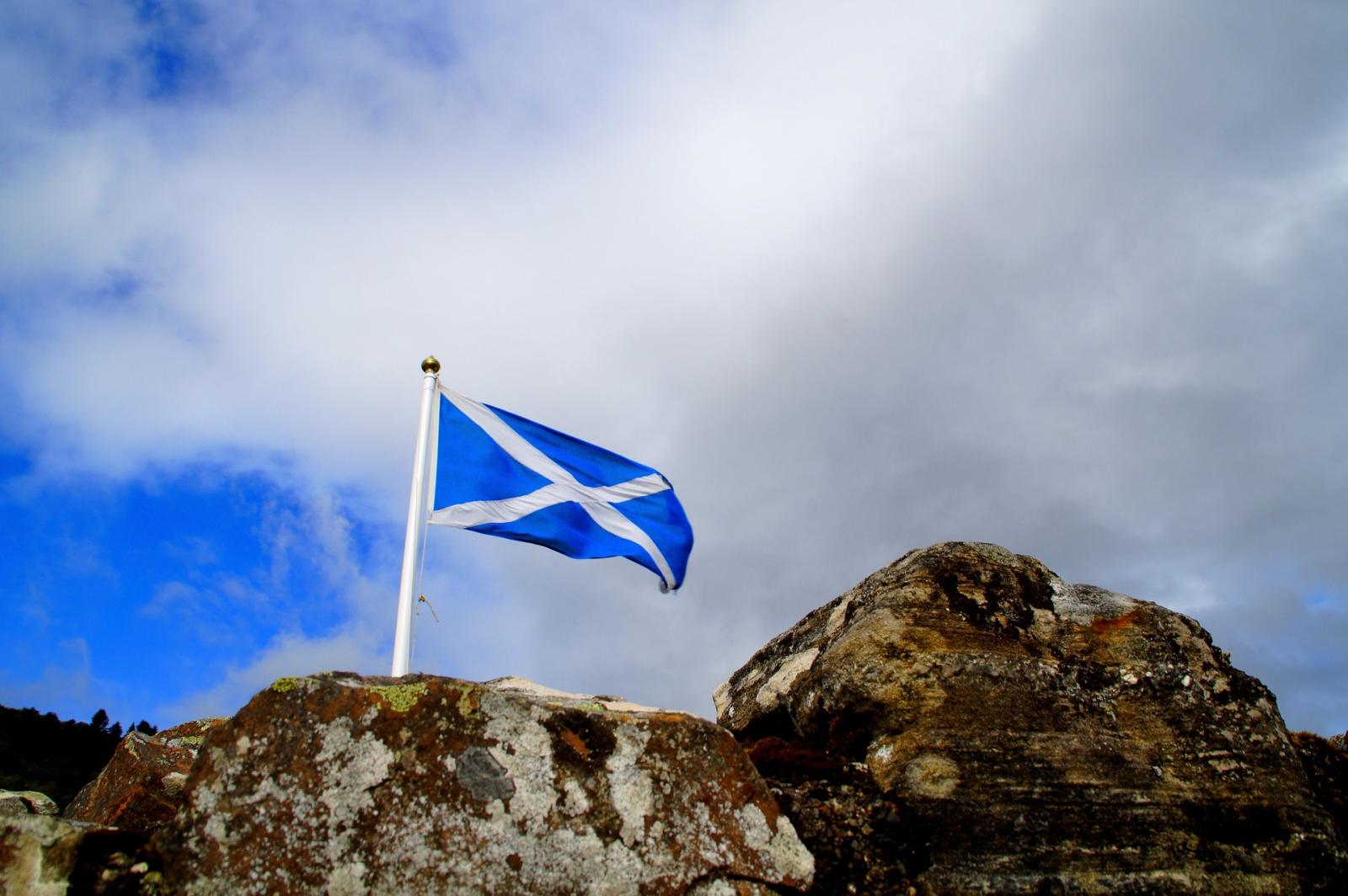 Scotland flag flying at Loch Ness. Photo credit: Pixabay