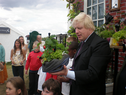 Boris Johnson participating in Sustain's Capital Growth food growing event when he was Mayor of London. Photo Credit: Sustain