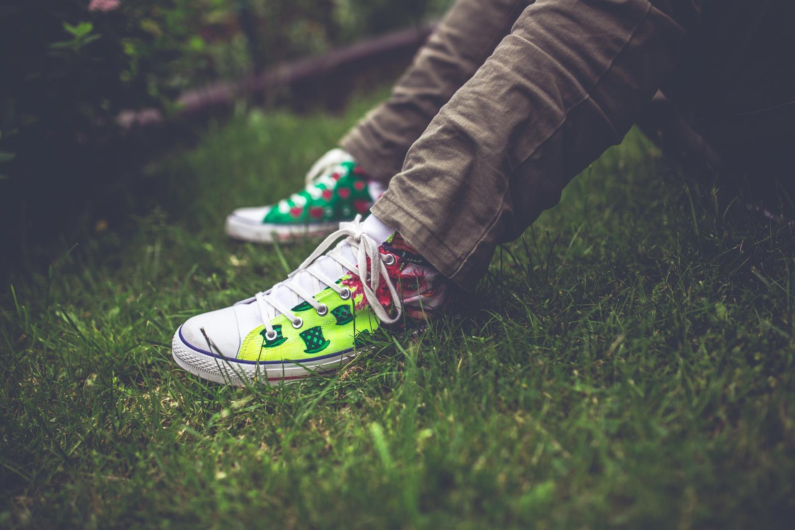 Teenager on grass. Photo credit: Pexels