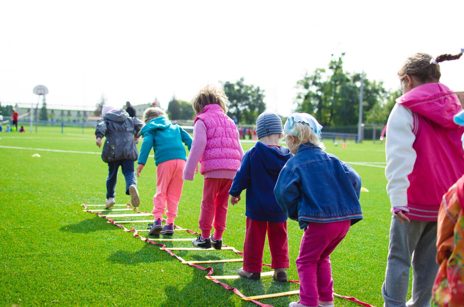 Children playing outside. Photo credit: Lukas at pexels